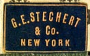 G.E. Stechert & Co., New York, NY  (navy/khaki, 21mm x 13mm, after 1905)